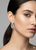 Atelier Gems front and back hoop earrings on a model