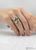 Side view of Atelier Gems green quartz ring with rhodium finished silver setting Hand model
