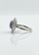 Elegant display of Atelier Gems  amethyst and white topaz statement ring