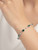 Side view of chrome diopside sterling silver bracelet with rhodium finish Atelier Gems