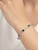 Side view of chrome diopside sterling silver bracelet with rhodium finish Atelier Gems