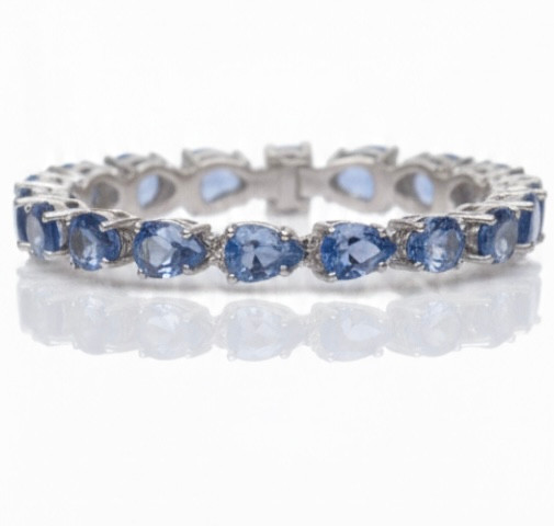 Atelier Gems Natural blue topaz bracelet displayed on Surface table