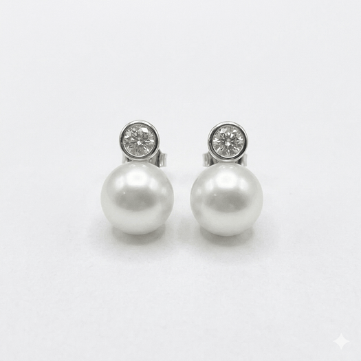 EFFY 14K white gold freshwater pearl and bezel diamond drop earrings on white background.