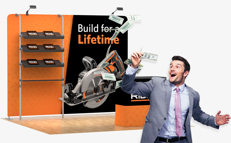 A man holding cash money in front of a trade show booth