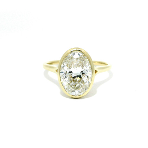 Oval Cut Lab Grown Diamond Bezel Set Solitaire Ring in 14kt Yellow Gold LGD-10250