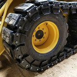 Skid Steer Over The Tire Tracks