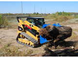 Demo-Dozer Skid Steer Grapple Attachment on Caterpillar