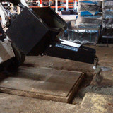 Blue Diamond Skid Steer Dispensing Bucket side angle pouring
