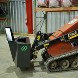 CID Mini Skid Steer Concrete Bucket Attached Lifted