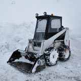 Keeping the cold out with the Cardinal Canvas skid steer enclosure