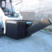 Blue Diamond Skid Steer Dispensing Bucket left angled view, attached