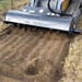 CID Skid Steer Rotary Tiller Attachment Tilled Earth.