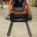 CID skid steer x-treme pallet forks - front view attached