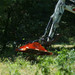 Excavator Rotary Brush Cutter Eterra Cyclone on bobcat