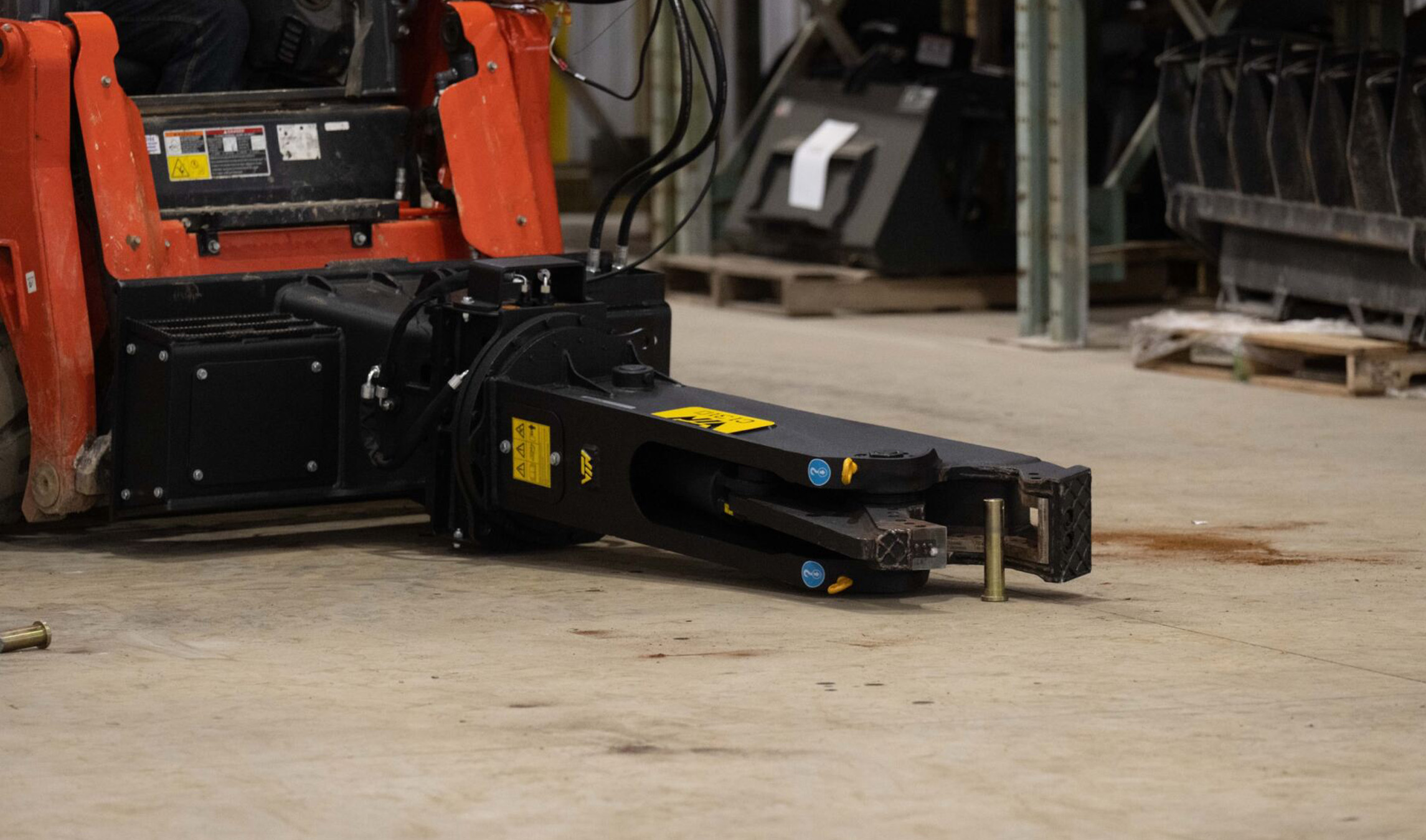 Skid Steer Scrap Shear Attachment closeup view of the VTN Scrap Shear attachment on a skid steer