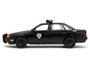 ROBOCOP & OCP FORD TAURUS DETROIT POLICE CAR WITH FIGURE 1/24 SCALE DIECAST CAR MODEL BY JADA TOYS 33743