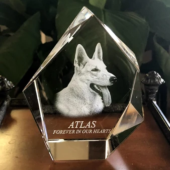 Crystal Print 3D Prestige Pet Crystal, a detailed engraved glass sculpture of a dog with the inscription 'ATLAS FOREVER IN OUR HEARTS'.
