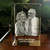 Crystal Print Anniversary Rectangular 3D Photo Crystal Block, engraved with a black and white photo of a happy elderly couple, with an engraved message at the bottom that says 'FAMILY, where life begins and LOVE never ends.'
