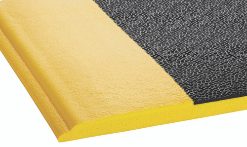 Close-up of Crown Mats Wear-Bond Tuff-Spun Pebble-Surface 3'x5' Black w/Yellow (WB 0035YP), showcasing its unique features and benefits.