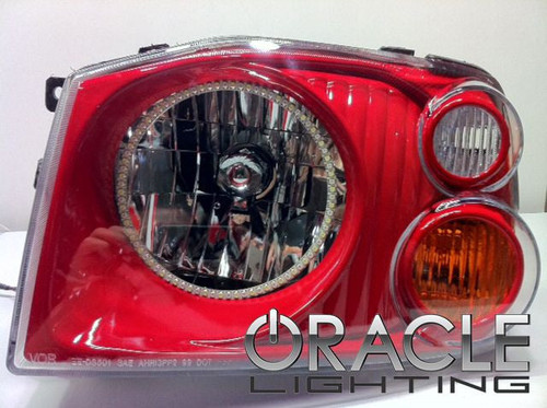 Front view of Oracle Lighting Nissan Frontier Headlights, White variant of Oracle Lighting Nissan Frontier Headlights, Red variant of Oracle Lighting Nissan Frontier Headlights, ColorSHIFT® Oracle Lighting Nissan Frontier Headlights w/ RF Controller, ColorSHIFT® Oracle Lighting Nissan Frontier Headlights w/ 2.0 Controller, ColorSHIFT® Oracle Lighting Nissan Frontier Headlights w/ No Controller, ColorSHIFT® Oracle Lighting Nissan Frontier Headlights w/ BC1 Controller, ColorSHIFT® Oracle Lighting Nissan Frontier Headlights w/ Simple Controller
