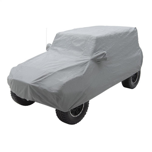 Grey off-road vehicle cover by Smittybilt, designed to shield Jeeps from harsh weather and environmental conditions.