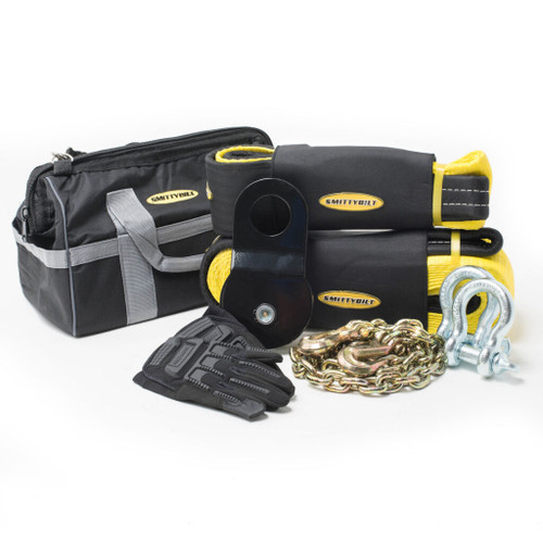 Vehicle tools and accessories are organized, with the Smittybilt Winch Accessory Bag as a key component for off-road readiness.