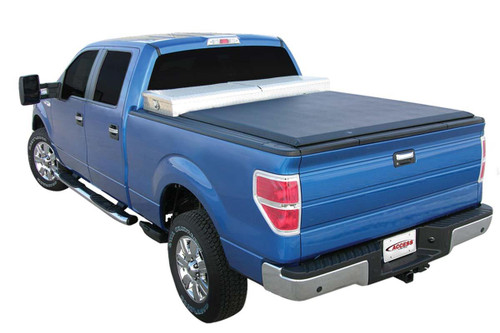 The Access 65329 Toolbox Edition Soft Tonneau Cover offers durable, weather-resistant protection while maintaining full access to your truck bed and toolbox. Made from premium marine-grade vinyl with a sturdy aluminum frame, it features a low-profile design, AutoLatch II dual locking system, and hook-and-loop fasteners for a secure fit. The XT-Dial tension adjusters ensure a tight seal, while the waterproof vinyl seals and foam gaskets protect against the elements. Designed for 6 1/2 ft. truck beds, this roll-up tonneau cover installs easily with a clamp-on system and requires no drilling.