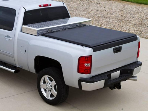 The Access 62339 Toolbox Soft Roll Up Tonneau Cover is designed for 2015-2019 Chevrolet Silverado and 2014-2018 GMC Sierra 1500, 2500, and 3500 models with an 8' bed. It fits behind most 20-21" over-the-rail toolboxes, providing secure, weather-resistant coverage without obstructing toolbox access. Built with an aluminum frame and UV-protected vinyl, it withstands extreme conditions. The XT-Dial tension adjusters allow tool-free adjustments, while the auto-latch and hook-and-loop sealing system ensure easy operation and reliable security for your truck bed.