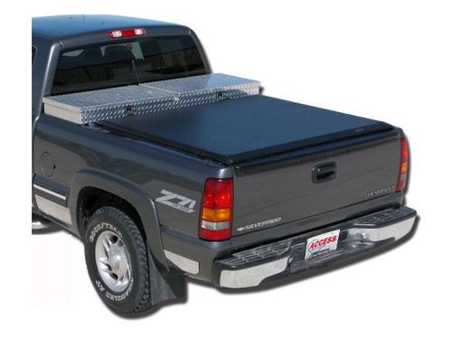 The Access 62199 Tool Box Edition Roll-Up Tonneau Cover provides durable protection against water, snow, and dust while allowing easy truck bed access. Featuring a twist-dial release system, dual-side latching, and an adjustable tension system, it ensures a secure fit. Made from heavy-duty vinyl with a painted finish, this roll-up tonneau cover installs easily without drilling.
