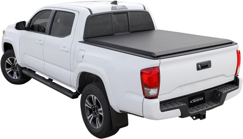 The Access 25049 Limited Edition Roll-Up Tonneau Cover offers durable, all-weather truck bed protection with a sleek, low-profile design. Made from heavy-duty vinyl and aluminum, it safeguards against water, snow, and dust. The Auto Latch II locking system enhances security, while the TrailSeal tailgate gasket ensures a snug fit. Installation is simple with no drilling required. Featuring a handy tension adjuster and tie-down clamps, this roll-up cover provides easy access to cargo. Backed by a limited lifetime warranty, it's built for long-term reliability.