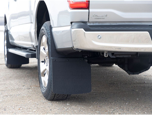 The Access E200002109 ROCKSTAR Hybrid Splash Guard Mud Flaps are designed for pickups and SUVs, providing durable protection with a 12-inch width and 10-inch length. Featuring a rust-proof aluminum frame and aluminum-compound rubber, these mud flaps offer maximum strength and flexibility, remaining pliable to -40°F. With a multipurpose tapered edge, they allow for flush or offset mounting. These mud flaps are customizable with optional rubber lengths for a perfect fit, ensuring vehicle protection without causing damage. Ideal for both form and function, they safeguard against snow, mud, and debris.