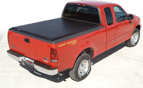The Access 11219 Original Roll-Up Tonneau Cover by Agri-Cover offers reliable truck bed protection from water, snow, and dust. Designed with a twist-dial release system, it ensures quick access while dual side latches lock securely. Its tension adjuster provides a snug fit, and the roll-up style allows easy handling. The painted exterior finish adds a sleek look, and installation is hassle-free. Backed by a limited lifetime warranty, this durable cover is a practical solution for preserving your truck bed. Model number 11219, UPC 834532000098. Perfect for convenience and protection on the go.