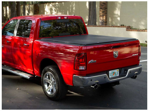 The Access 44259 Compatible with Dodge Ram 2500 3500 6' 4" Lorado Roll-Up Tonneau Cover provides durable, weather-resistant protection for your truck bed. Made from reinforced vinyl, it shields against water, snow, and dust while maintaining a sleek, low-profile look. The XT-Dial tension adjuster allows for easy customization, ensuring a secure fit without tools. With a no-drill installation and a front seal for added protection, this roll-up cover offers convenience and reliability in all conditions.