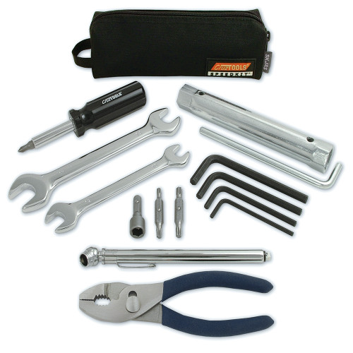 A set of SPEEDKIT tools including wrenches, pliers, and a tool bag arranged neatly on a surface.