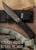 SOG m37n-cp seal pup fast 4,75" pulverlakeret kombiblad, grn håndtag