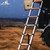 Overview of Tuff Stuff Roof Top Tent Telescoping Extension Ladder, Close-up of Tuff Stuff Roof Top Tent Telescoping Extension Ladder, Tuff Stuff Roof Top Tent Telescoping Extension Ladder on daytime