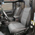 Jeep interior showcasing gray seats adorned with Smittybilt 20C Gladiator JT Gen2 Neoprene seat covers.