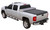 The Access Covers 65239 Access Tool Box Edition Tonneau Cover offers secure, weather-resistant truck bed protection while maintaining access to a crossover toolbox. Made from marine-grade vinyl with a durable aluminum frame, it features a low-profile design, AutoLatch II dual locking system, and X-Dial tension adjusters for a secure fit. Hook-and-loop fasteners allow easy access, while waterproof seals and foam gaskets keep cargo dry. The simple, clamp-on installation requires no drilling. Made in the USA, this roll-up tonneau cover comes with a 5-year warranty.