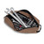 A brown bag filled with tools and items from the Switchback Compact Dirt Bike Tool Kit.