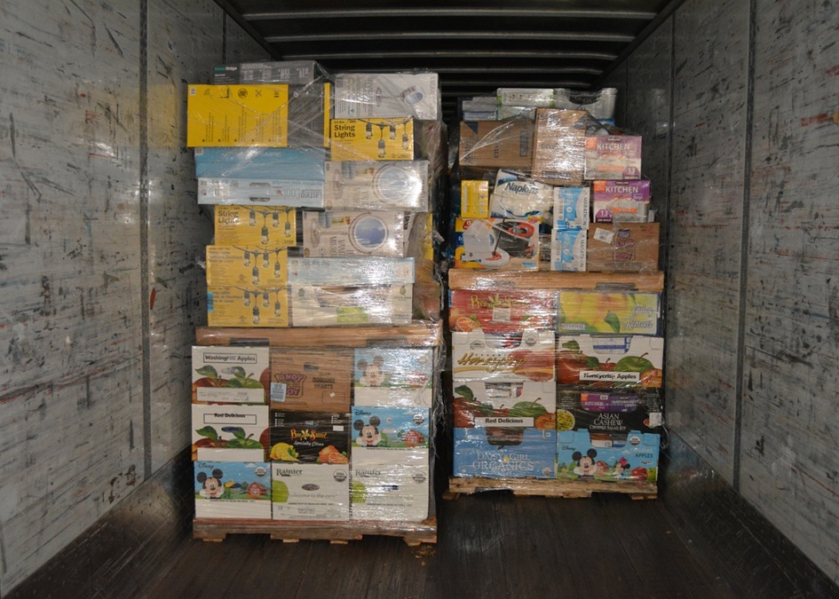 Image of several pallets shrinkwrapped and loaded in to a half full LTL truck
