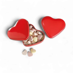 Heart shaped metal tin box with candies