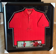 Tiger Woods Signed Limited Edition Framed Sunday Red Golf Shirt - Upper Deck Authenticated.  This is #20 of a numbered limited edition of only 25.  VERY RARE.  Signed in 2007, Tiger's prime.  Never hung or displayed.  HUGE autograph measures approximately 5x6 inches.  UDA certificate of authenticity with matching hologram on the shirt.  Frame is approximately 40x40 inches.