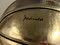 Close up of Muhammad Ali's signature on the basketball.