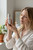 Woman Holding Joli Pro Retinol Serum