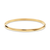 Elegant Gold Star Bangle can be worn alone or stacked for added interest with any outfit. This timeless bangle seamlessly integrates into any bracelet stack, showcasing the versatility of soft brushed gold