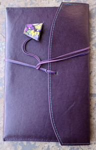 Leather Satchel with kangaroo leather wrapping strap. Available in a range of leather colours. Deep Violet Purple is shown here.