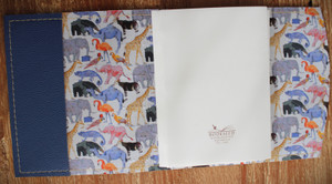 Hand stitched leather journal lined with Liberty of London fabric. Queue for the Zoo by OK David.