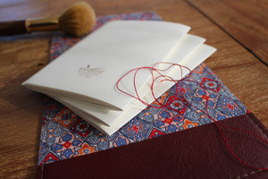 Handstitched A6 Journal in Cherry Red Leather.  Lined with Enamour Liberty of London Fabric.