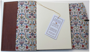 A5 genuine leather journal lined with Love Birds Liberty of London fabric.