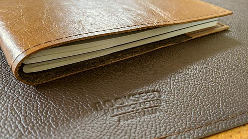 Handmade genuine leather Moleskine Cover.  Can hold two notebooks.